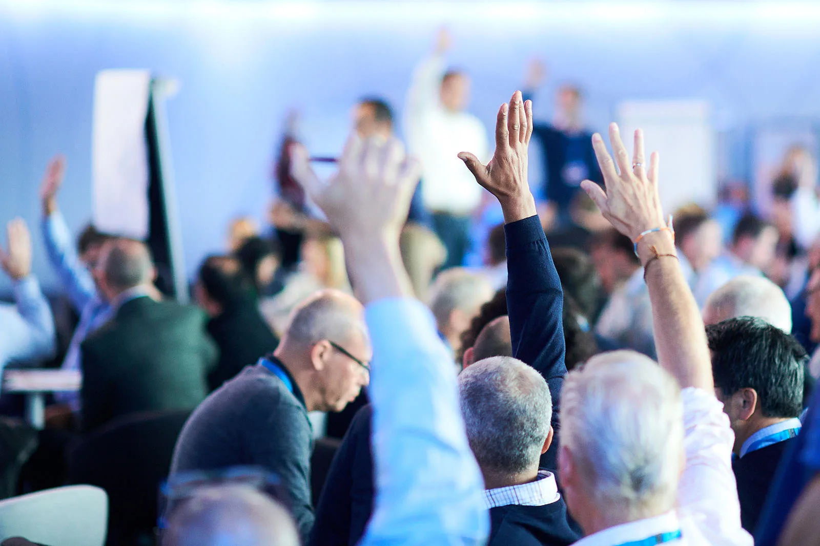 Corporate event speaker on stage